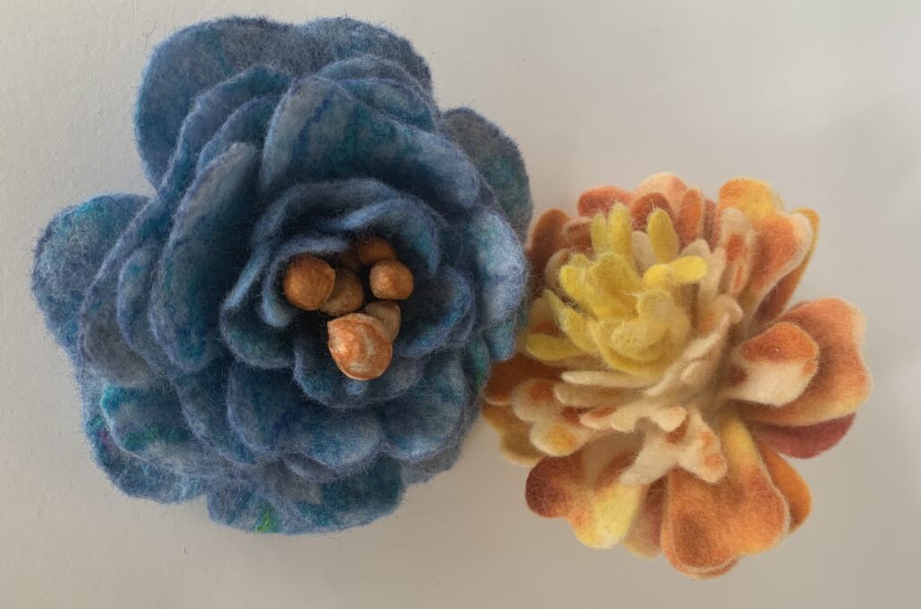 2 sculptural felt flowers